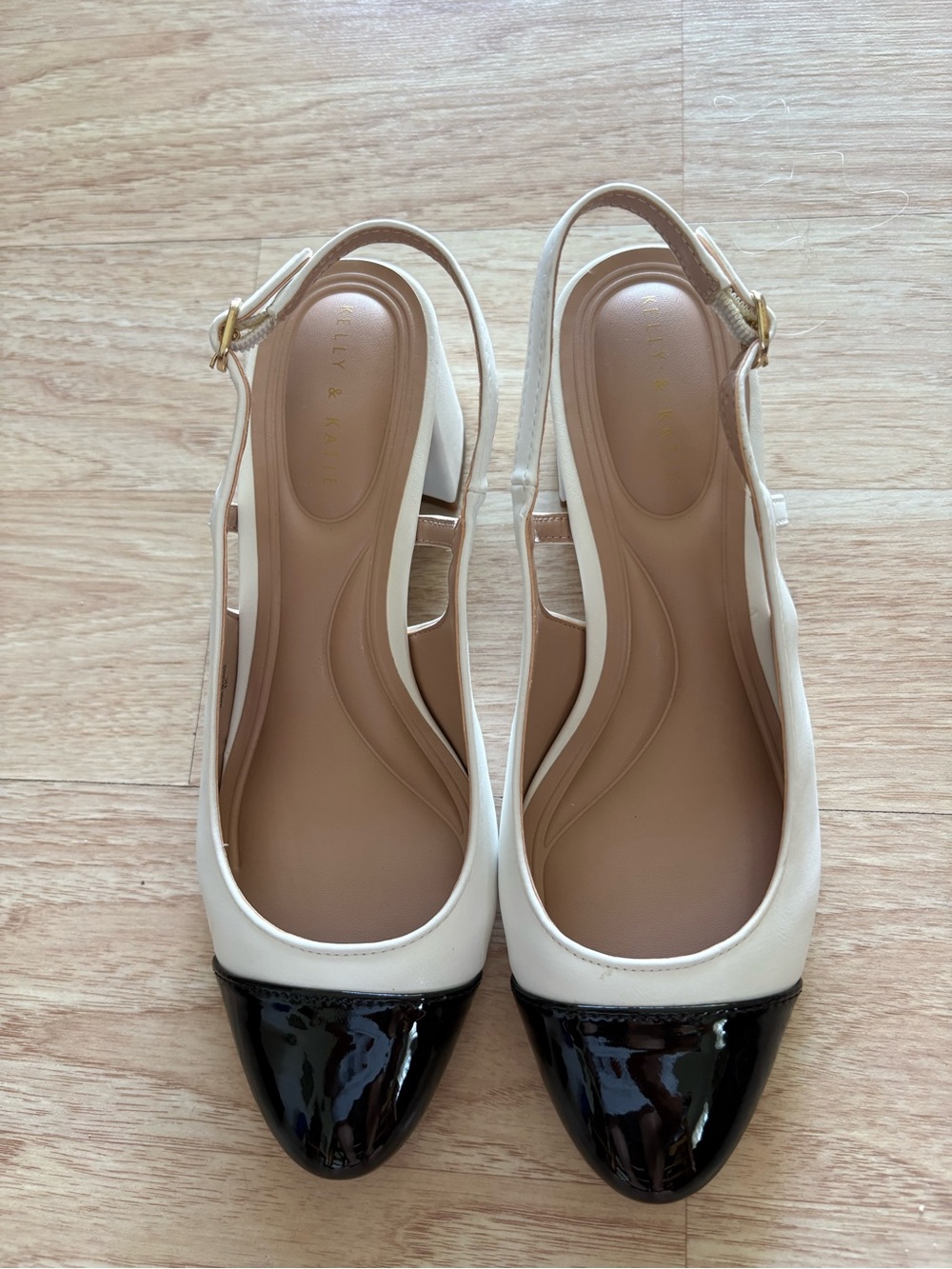 Kelly & Katie Two-Tone Slingback Flats in Cream and Black Patent
